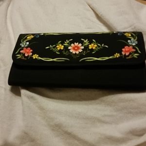 Women's silk embroidery cloth clutch could be French or Italian.